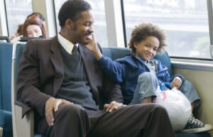"A Procura da Felicidade" está entre os filmes para assistir neste Dia dos Pais. Foto: Reprodução/Netflix.