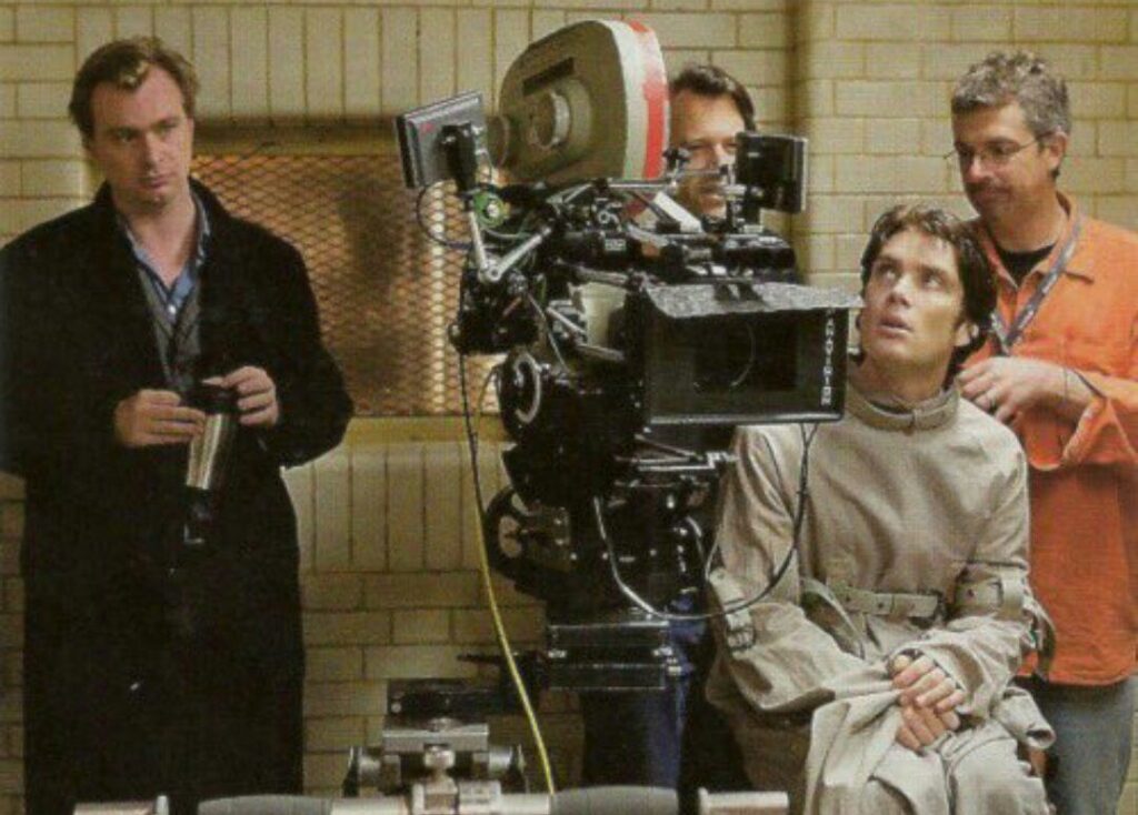 Christopher Nolan e Cillian Murphy em Batman Begins (2005). Foto: Divulgação.