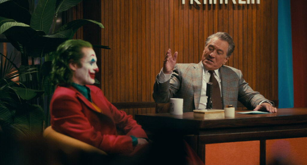 Joaquin Phoenix e Robert De Niro em "Coringa" (2019).
Foto: Reprodução//DC Studios.